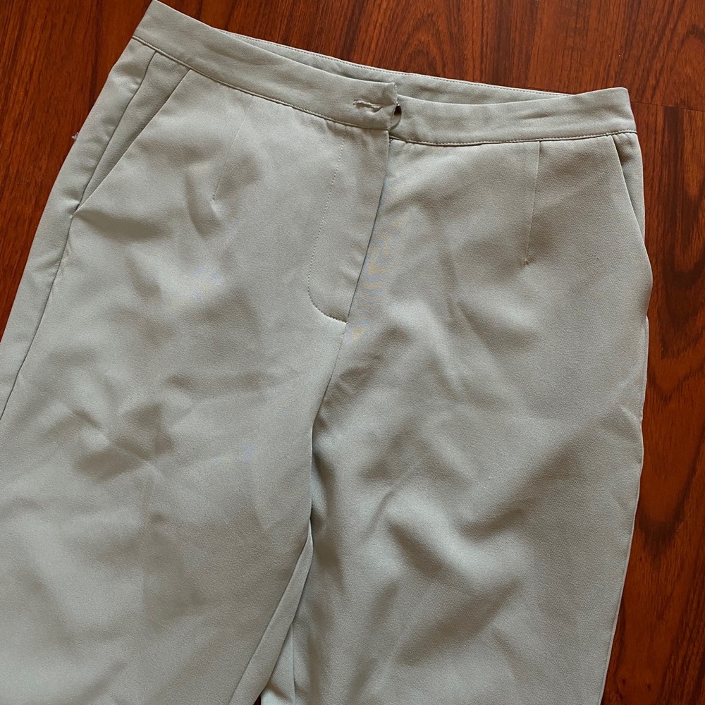 Sage green trousers